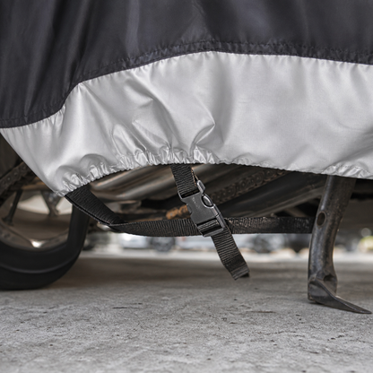 Windproof buckle and elastic hem detail under motorcycle cover