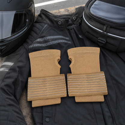 Two beige wrist wraps with motorcycle riding gear